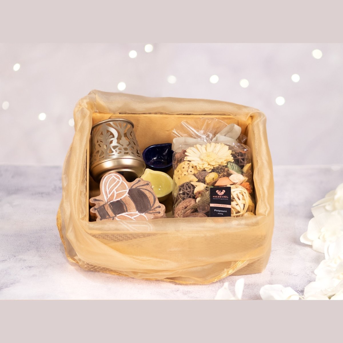 Kezevel Festive Gift Hamper - Handcrafted Metal T-Light Holder with Candle, 6 Wooden Coaster, 2 Ceramic Diya, 1 Fragranced Potpourri, Size - 28X24X9CM - Kezevel